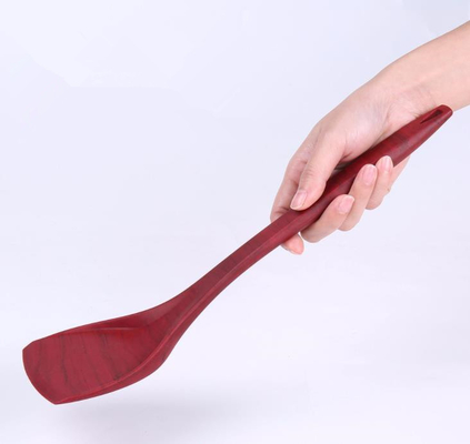 木製の穀物は焦げ付き防止鍋のための用具を調理している食品等級のシリコーン ターナーのスタイルを作ります
