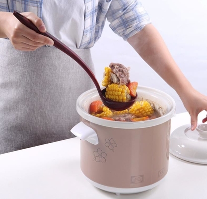 木製の穀物の表面の長いハンドルの食品等級のシリコーンのスープ用のスプーンの台所用具